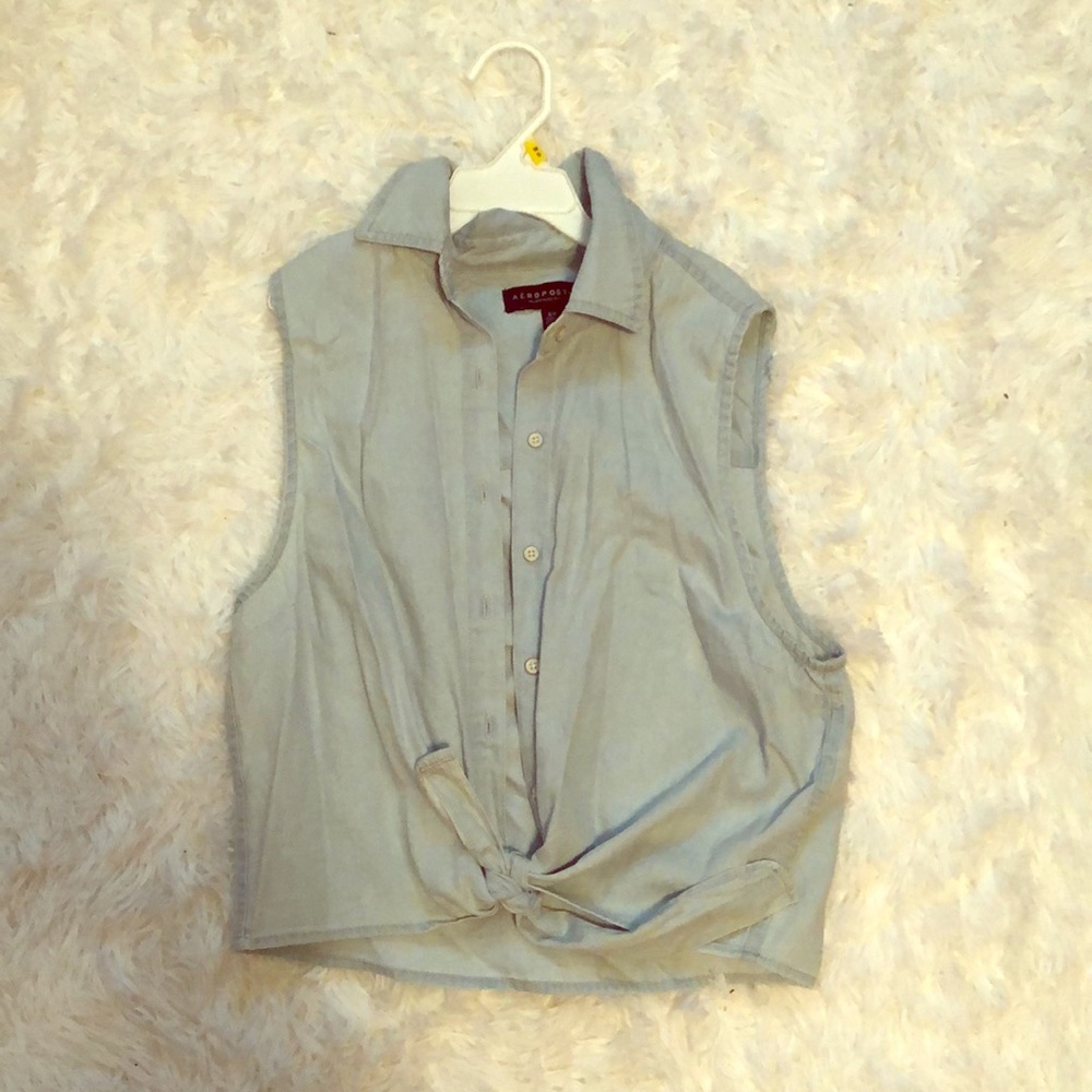 Blue crop lightweight vest with tie at bottom